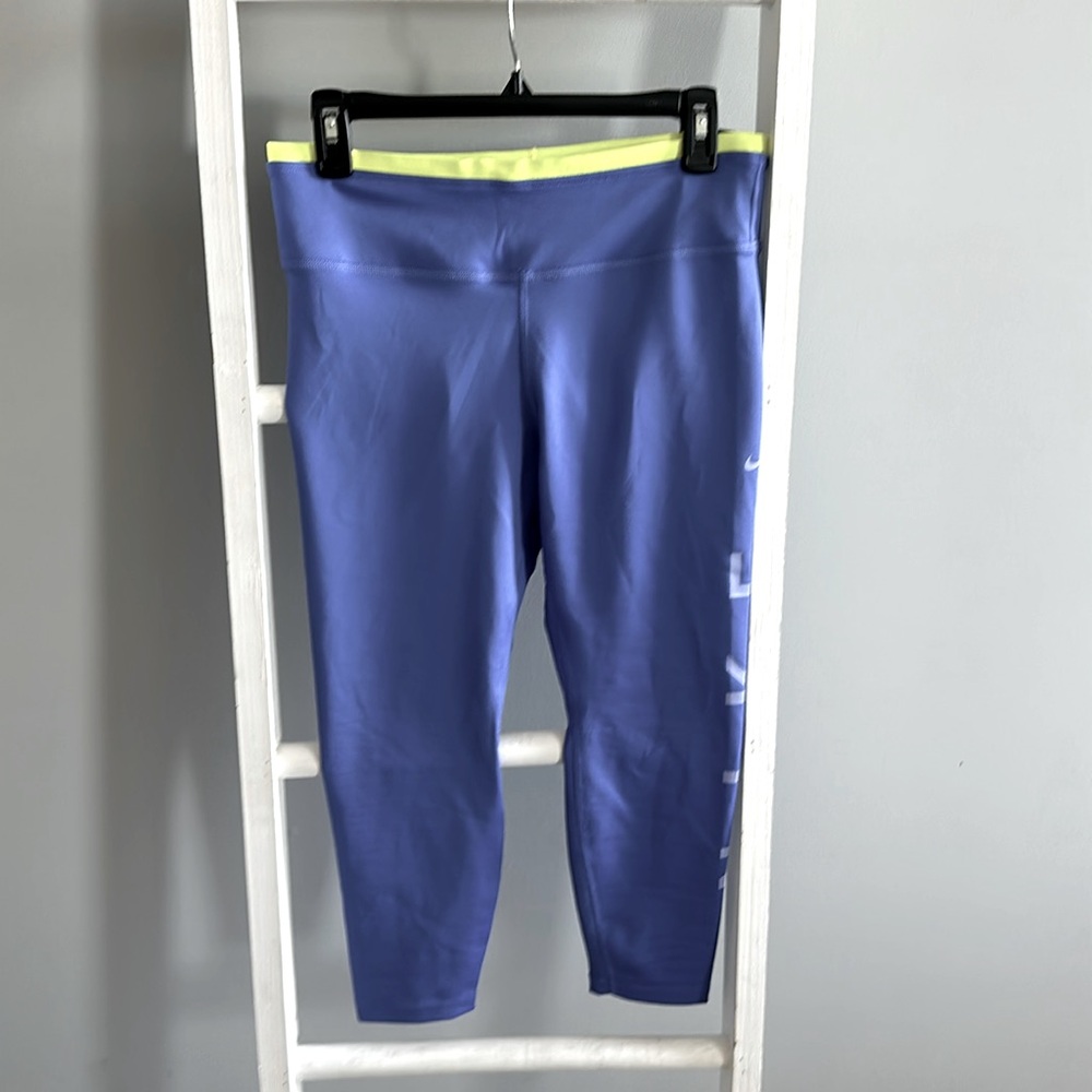 Nike purple and neon yellow mid rise dry fit crop leggings